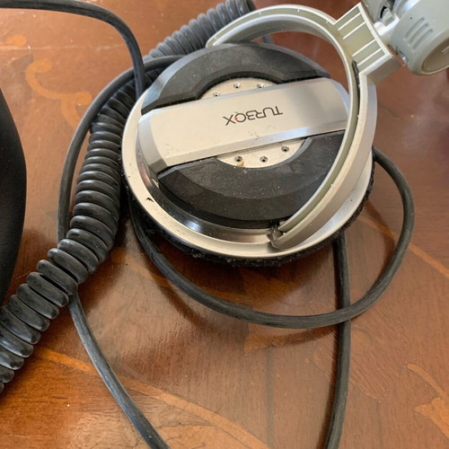 Turbo X headphones used with coiled cable and 3.5mm jack plug