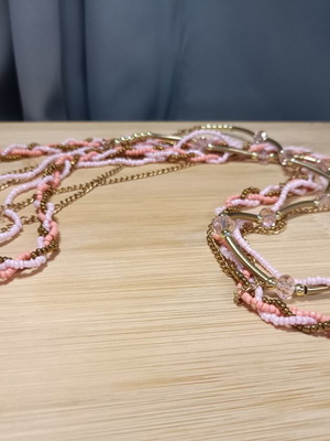 Long pink necklace with mixed chains