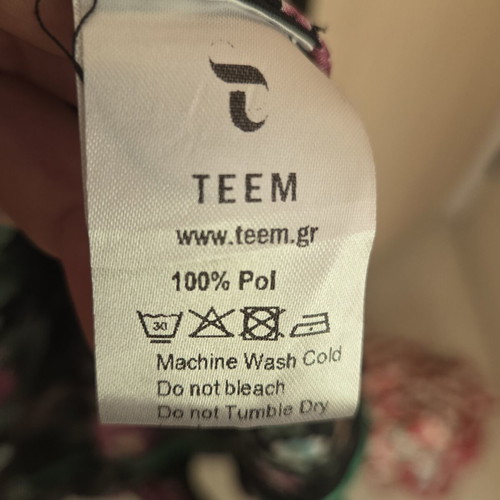 Teem long dress with belt, like new, black with colorful patterns