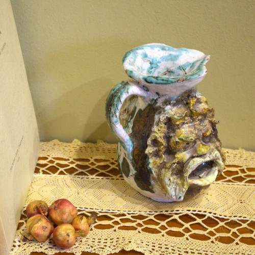 Decorative vintage jug used with mascarons