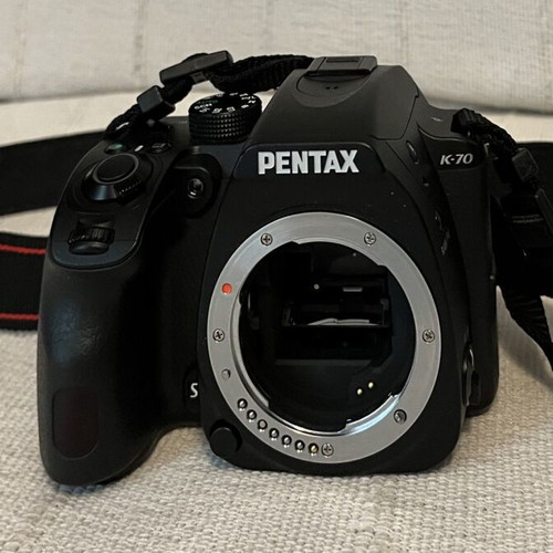 Pentax K-70 SLR digital camera with two lenses and accessories