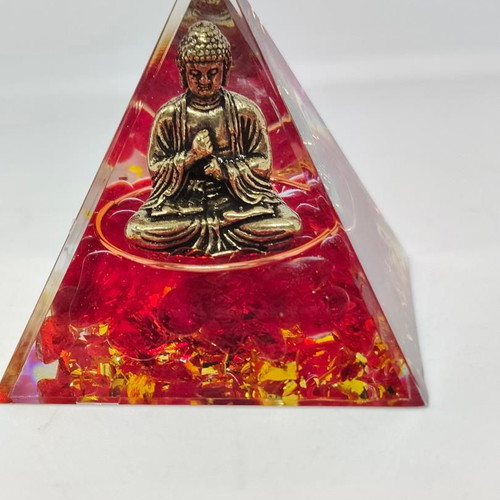 Orgonite pyramid with Buddha and red quartz like new