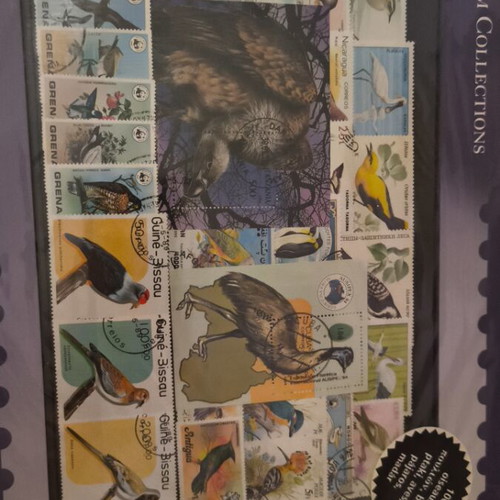 Collection of 100 sealed bird stamps from various countries