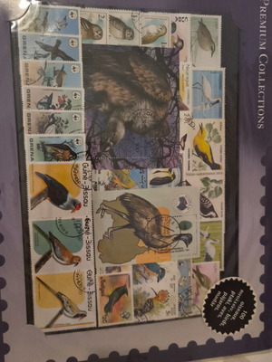 Collection of 100 sealed bird stamps from various countries