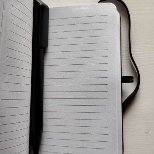 Black Notebook with Elastic Band and Pen like new