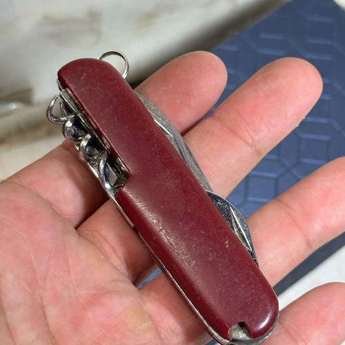 Vintage pocket multitool 6 in 1 with corkscrew and openers used