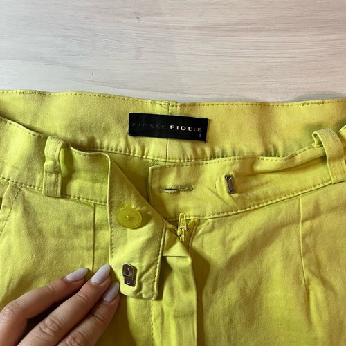 Yellow elastic pants used, size Small-Medium