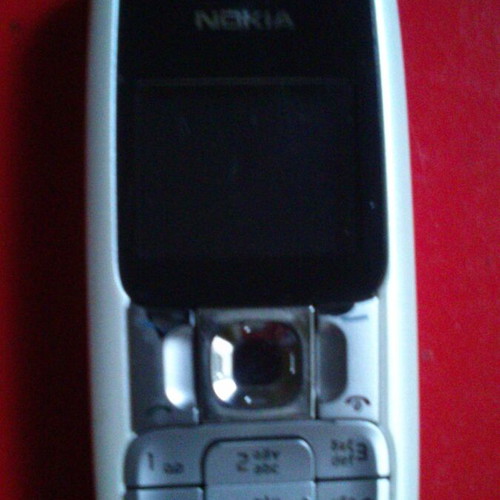 Nokia 2310 mobile phone with compatible battery
