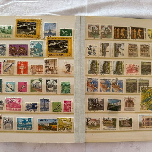 Stamp album collection #987 like new, 16 pages, 987 stamps