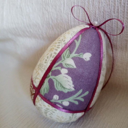 Decorative pink lilac floral egg used for Easter and spring decor