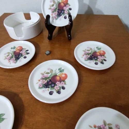 Vintage bakelite coasters like new with fruit design