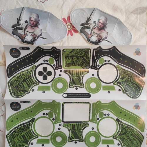 PS4 Dual Shock Skin new, set of 4 with Alien and Witcher themes
