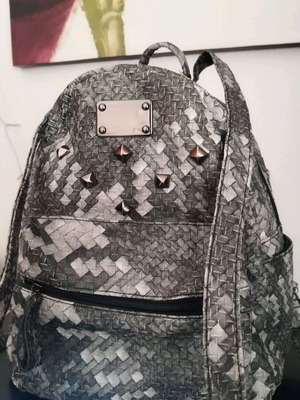 Grey backpack like new with studs