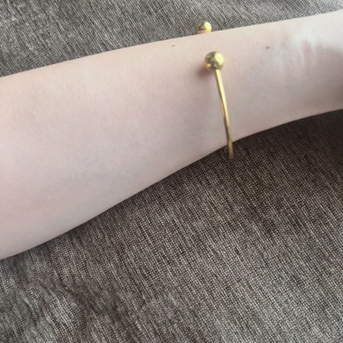Handcuff bracelet like new, gold color