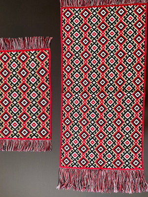 Set of 2 handmade woven decorative textiles with geometric pattern