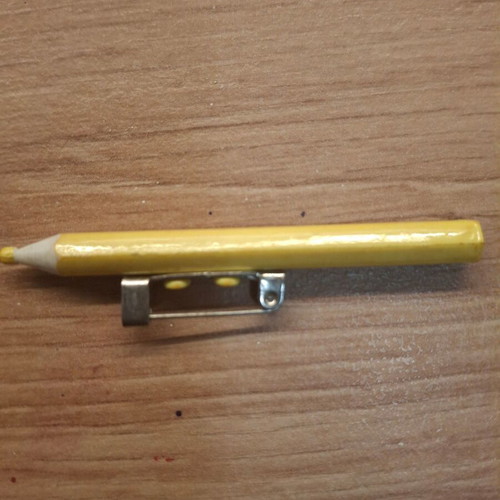 Yellow pin brooch