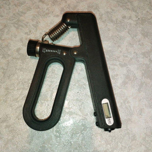 Grip trainer like new with adjustable weight, repetition counter and timer