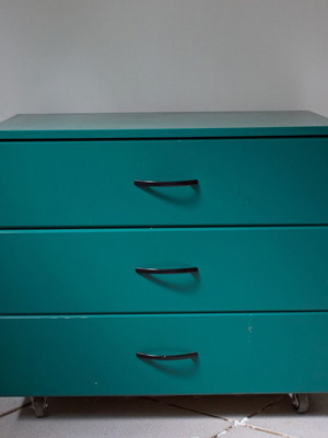 Wooden drawer cabinet used green with 3 drawers and wheels