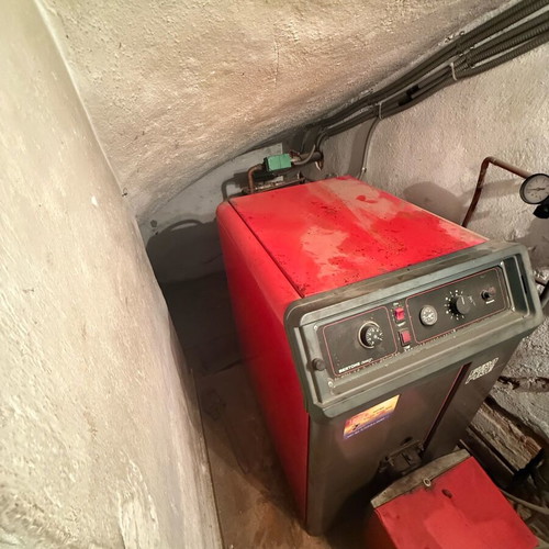 Oil boiler used with accessories for two apartments