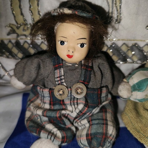 Vintage collectible dolls used with porcelain faces and fabric bodies
