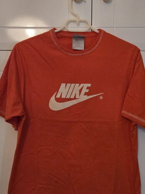 Nike orange T-shirt with logo, size S