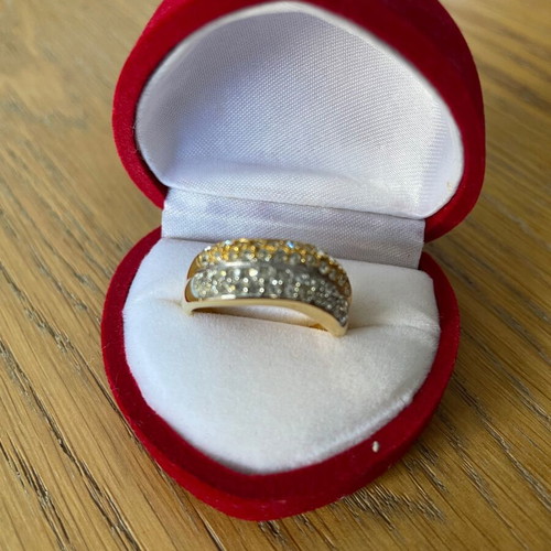 Ring new with two colors gold and silver with zircon unused