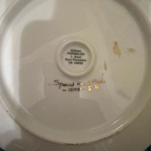 Decorative plate new, handmade from a renowned house