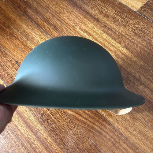 Vintage metal English-style helmet, restored