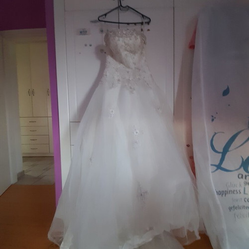 Wedding dress ivory used, strapless with thin extra straps, size small