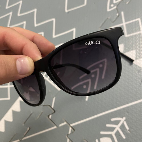 Gucci sunglasses used, black, broken arm
