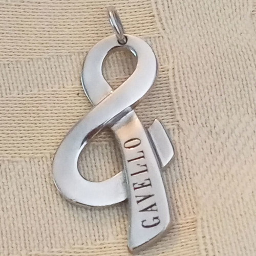 Very Gavello white gold pendant 9k used, treble clef design
