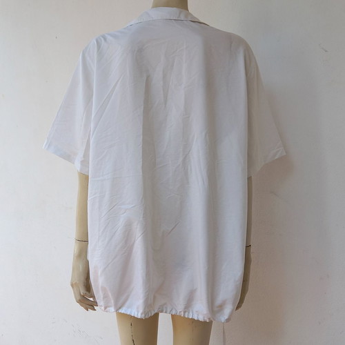 Oversize white shirt used with drawstring detail