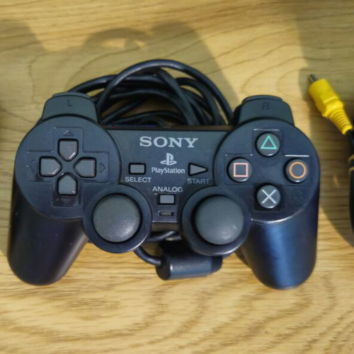 Sony PlayStation 2 Slim 9000X console bundle with 5 games, controller, memory card, cables