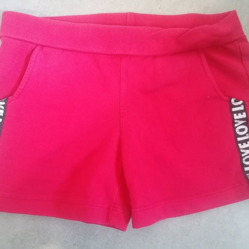 Girls' beach set used, swimsuit with crisscross back and shorts