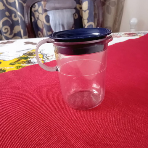 Vintage Tupperware jug with lid and handle like new