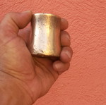 Brass weight with hole, 850 grams