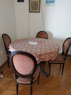 Wood-carved round table with 4 chairs like new