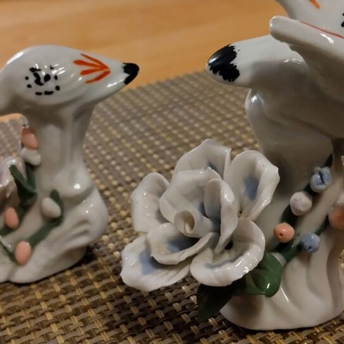 Porcelain miniatures pair with birds like new