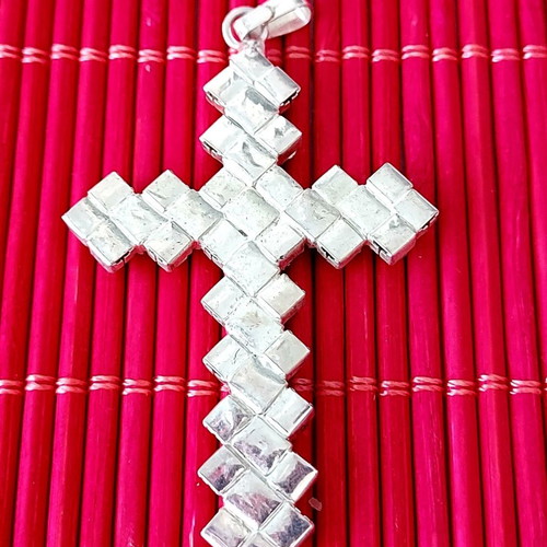 Cross used with white and black rhinestones