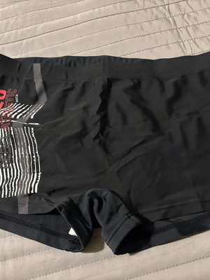 Men's swimming trunks used, size S, black and red