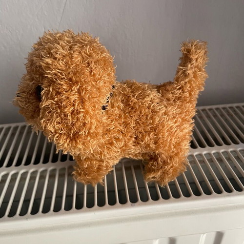 Dog toy that makes sound and moves like new