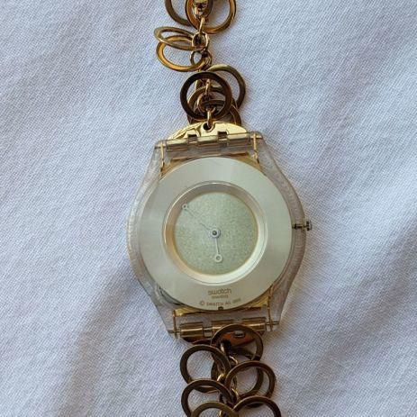 Swatch women's watch used with gold chain strap