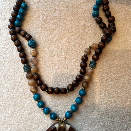 Long handmade necklace with wooden beads in brown and turquoise, like new