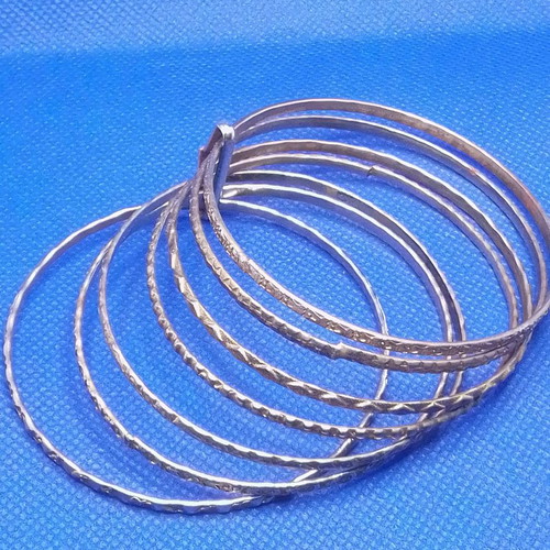 Metal bracelet with 7 rings used