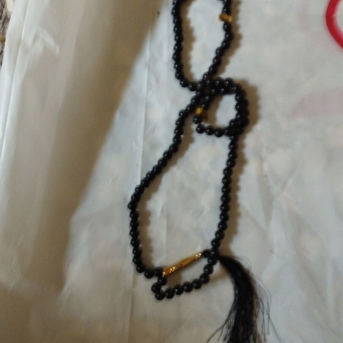Okapi folding knife with rosary gift, like new