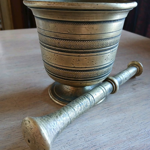Antique brass mortar used with subtle design