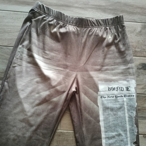 Elastic bell-bottom pants with front print, like new, size XL