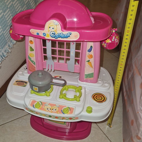 Children's kitchen playset like new with pot, knife, and fork