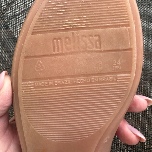 Ballerina shoes used with ink mark on one shoe