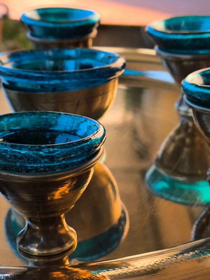 Vintage liqueur set used with bronze and blue glass cups